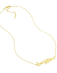 Delicate gold necklace with lobster clasp and script charm