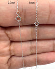 14K White Solid gold rope chain displayed on a hand with measurements indicated 0.7mm and 1mm
