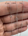 14K White Solid gold rope chain displayed on a hand with measurements indicated 0.7mm 0.8mm and 1mm