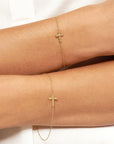 gold cross charm bracelet