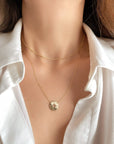 14k gold compass pendant