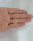 Yellow gold Tree of Life pendant on a solid gold twisted rope chain