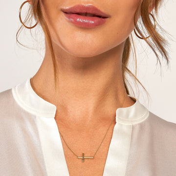 cross sideways necklace