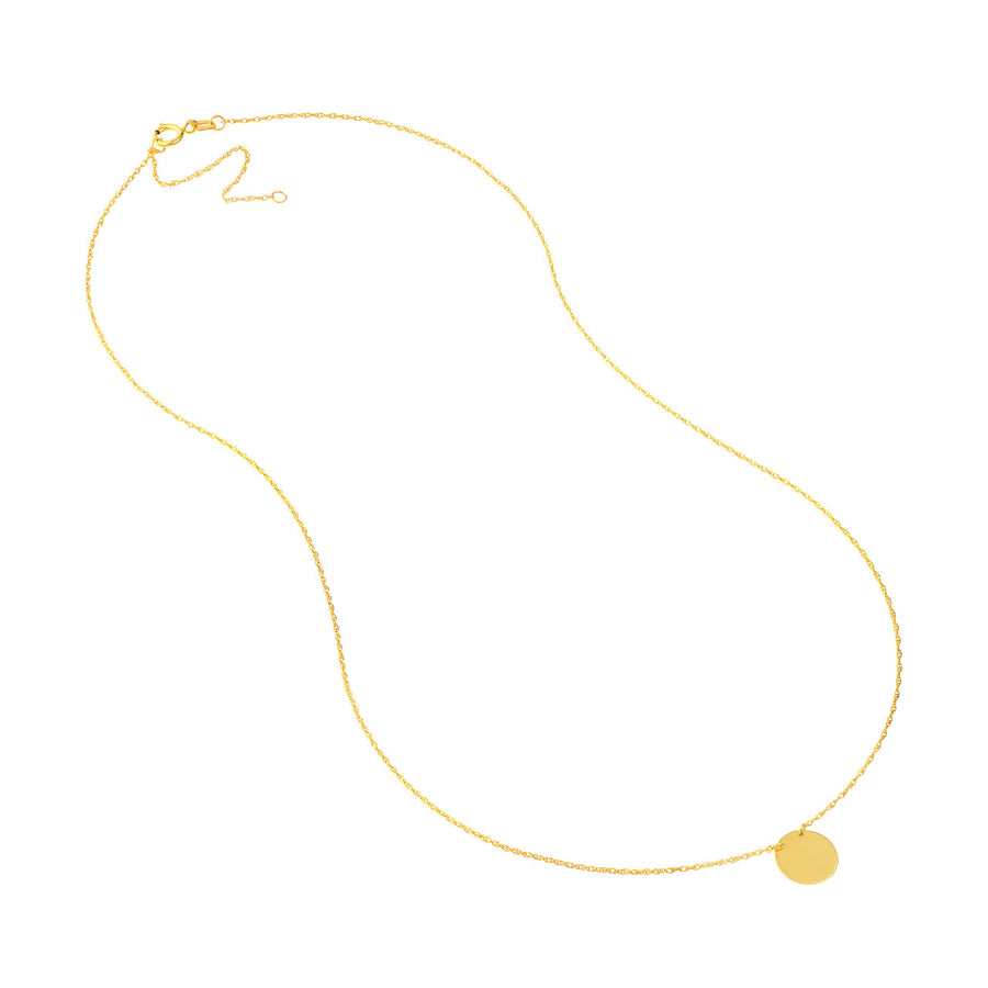 gold necklace with small circle pendant